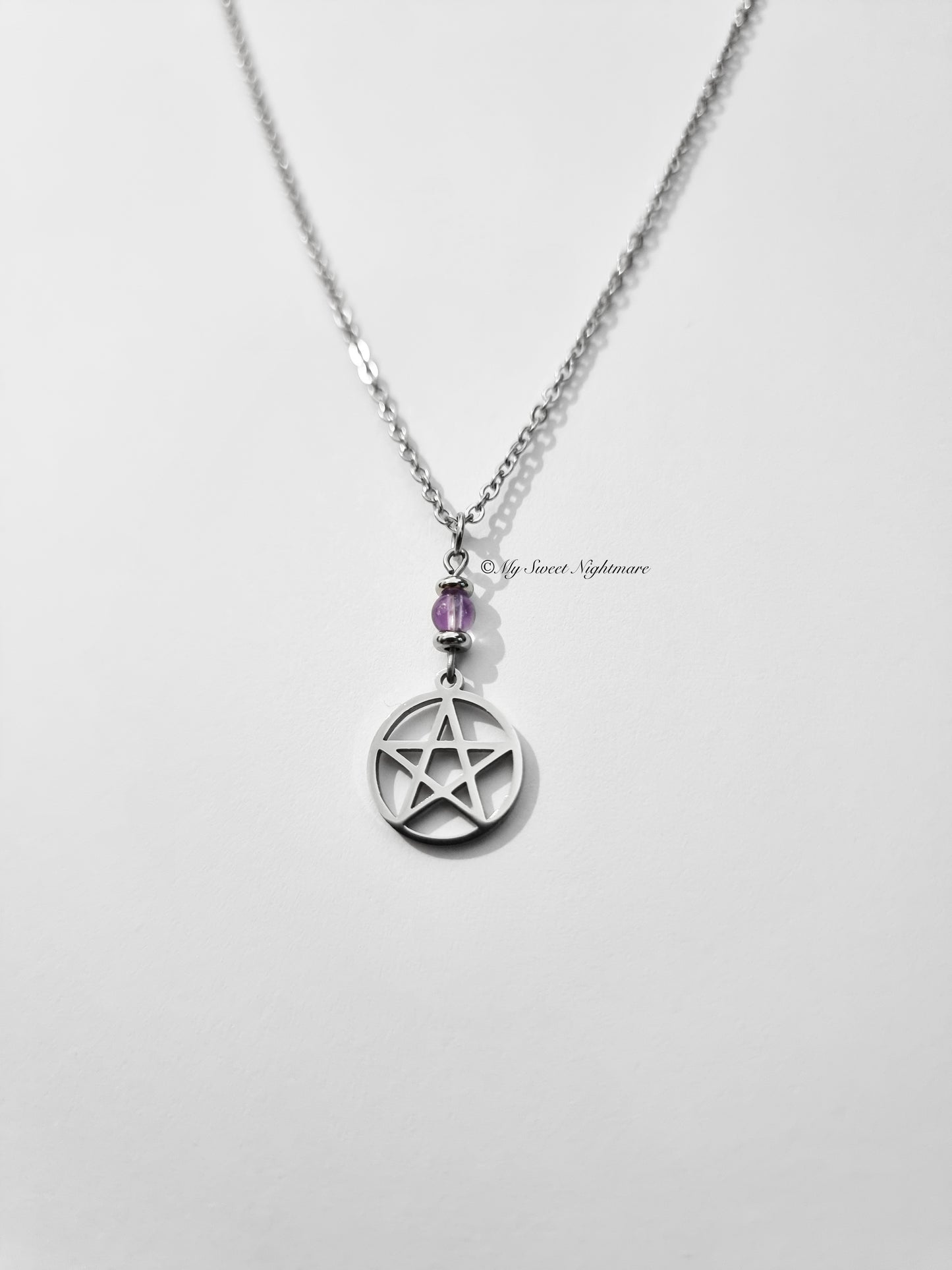Pendant with amethyst and steel pentagram